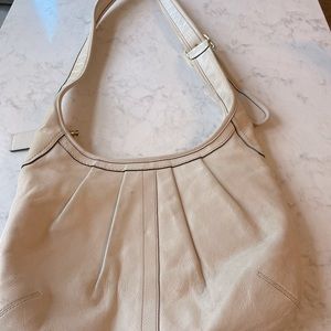 Coach tote cream with gold hardware.